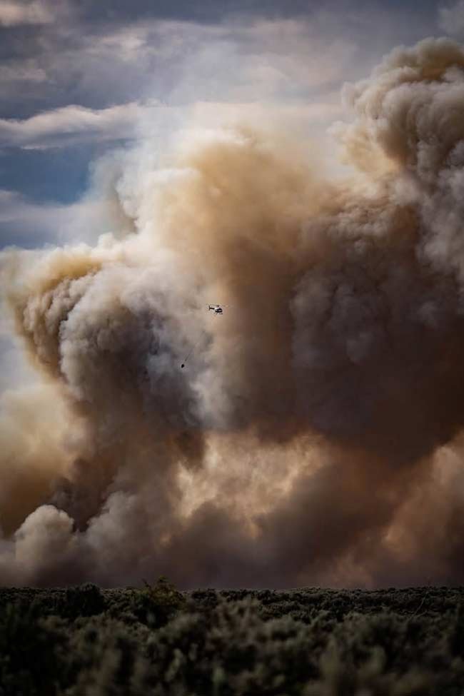 AMBAGES O fogo é mais contido à medida que o calor se instala no leste de Idaho